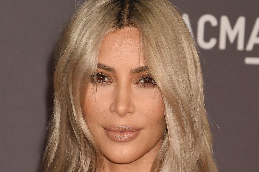 Kim Kardashian West Gradually Bleaches Her Hair To Prevent It From