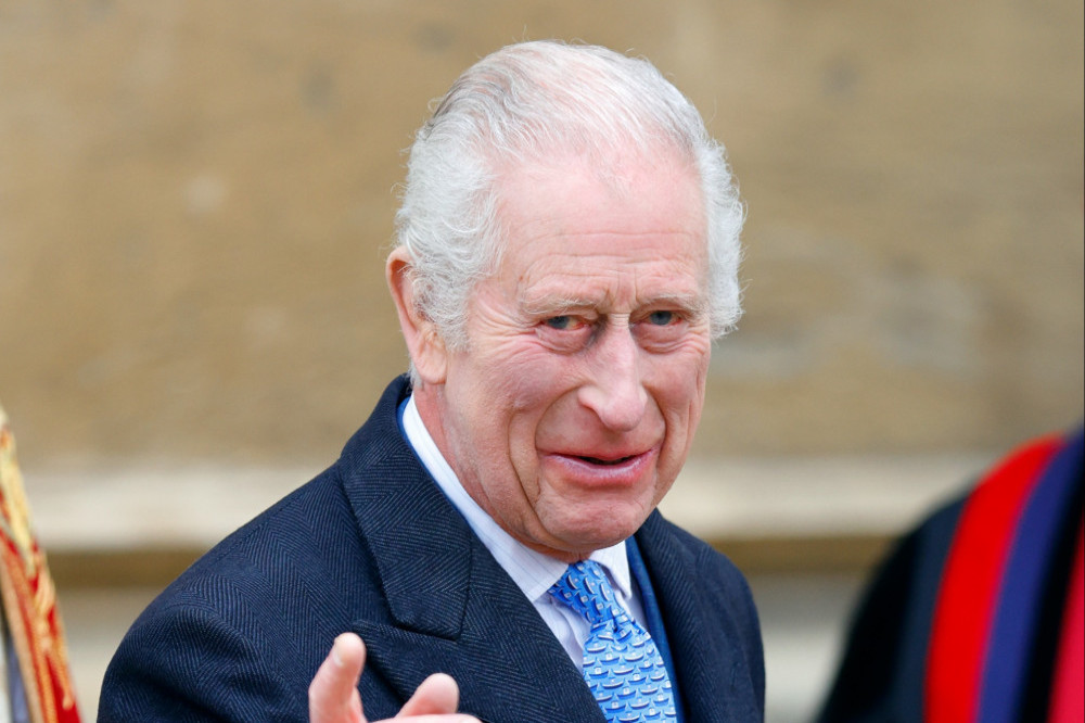 King Charles in good spirits amid walk around crowds at Windsor Castle