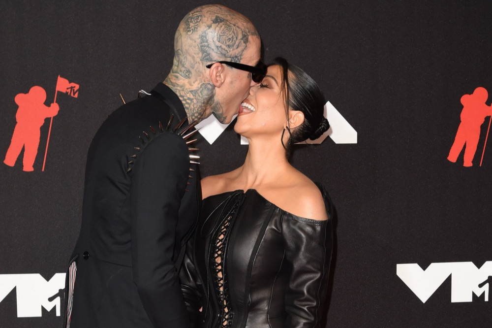 Kourtney Kardashian and Travis Barker appear to have shared a blood vial at their bachelor party