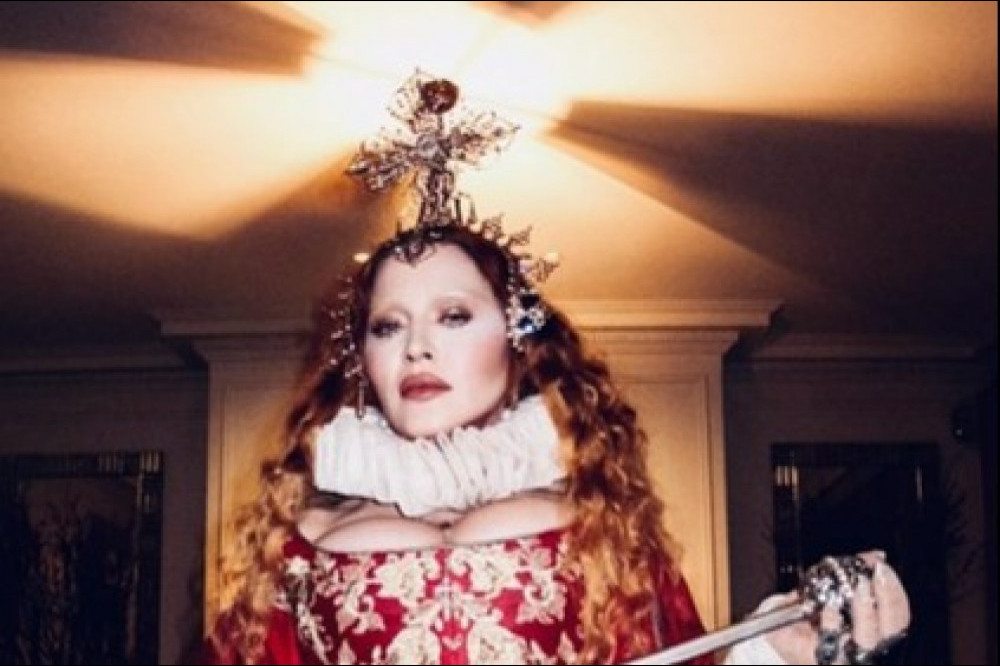 Madonna poses as the Queen of Hearts for Halloween