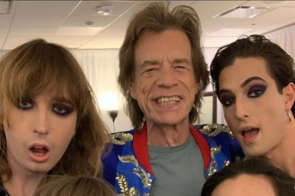 Maneskin pose with Sir Mick Jagger backstage at Vegas gig
