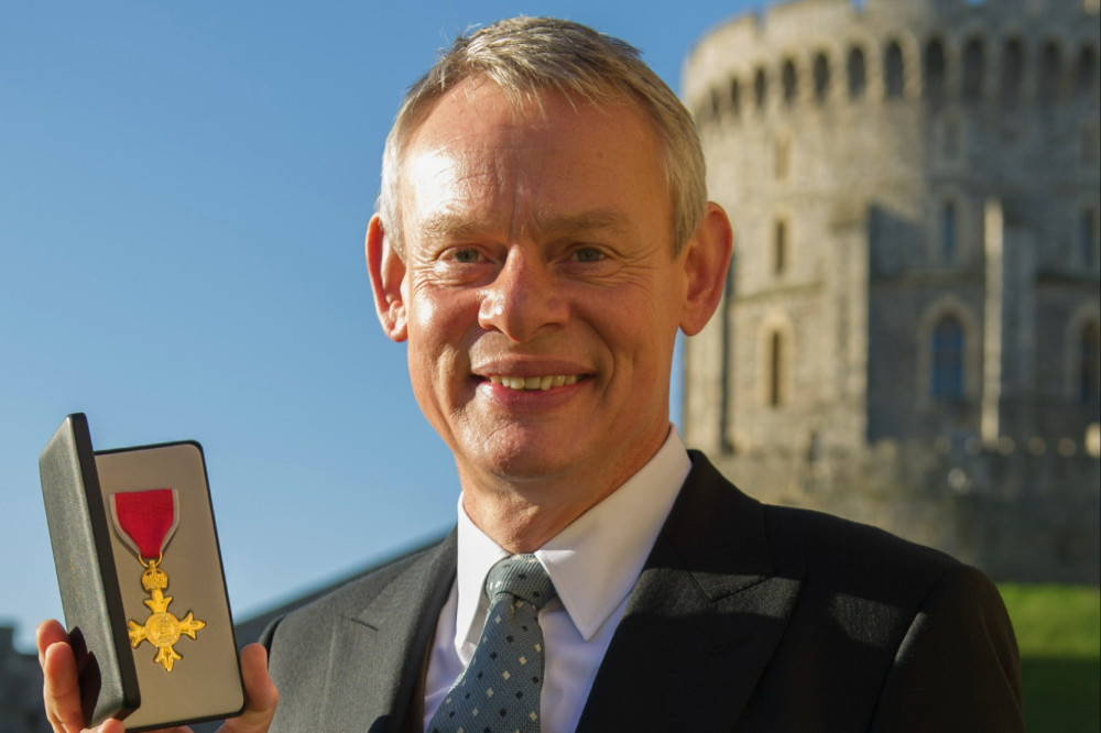 Martin Clunes has learned to embrace his protruding ears