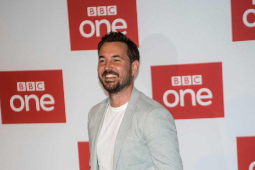 Martin Compston has hinted a new Line of Duty is on the way after a WhatsApp group change