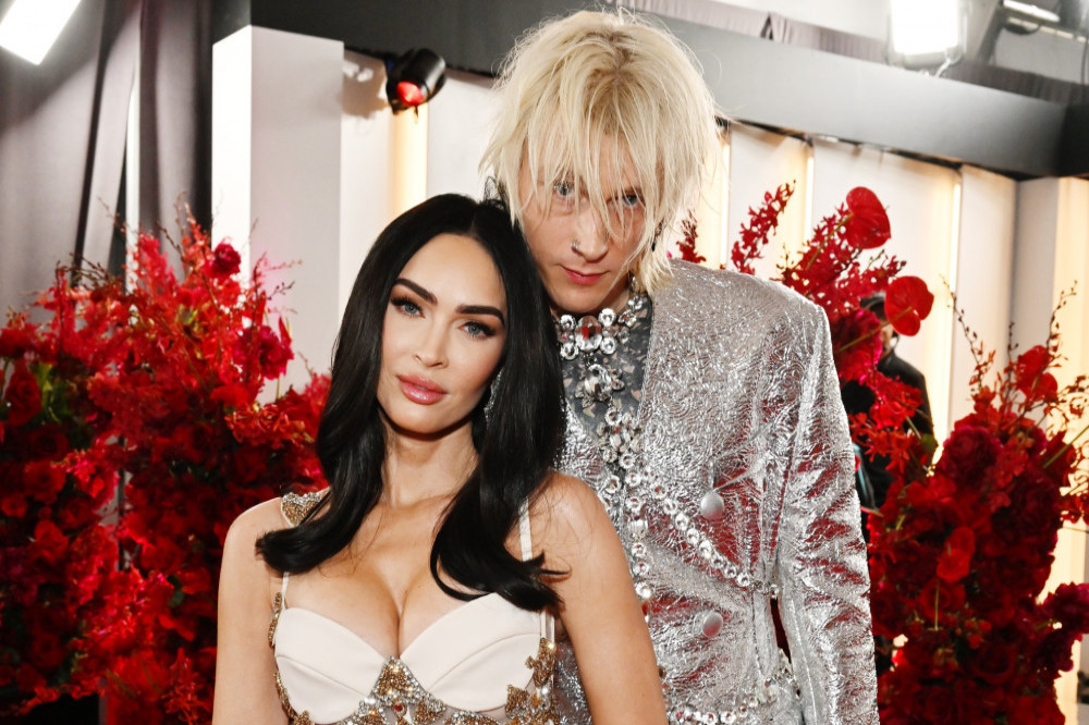 Megan Fox’s fiancé Machine Gun Kelly thought her ‘Sports Illustrated Swimsuit Issue 2023’ cover shoot was ‘hot‘