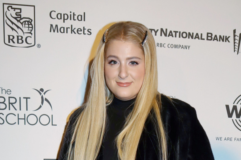Meghan Trainor loves to play Candy Crush in the studio
