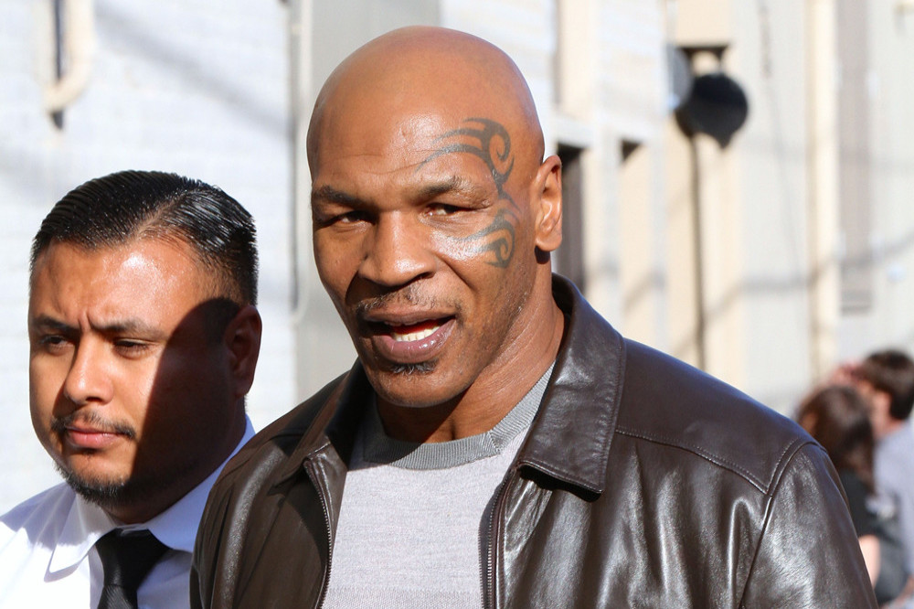 Mike Tyson's wife doesn't like him taking commercial planes
