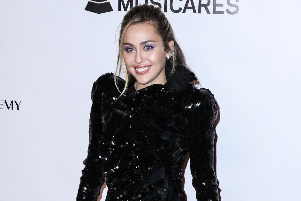 Miley Cyrus has discussed her touring struggles