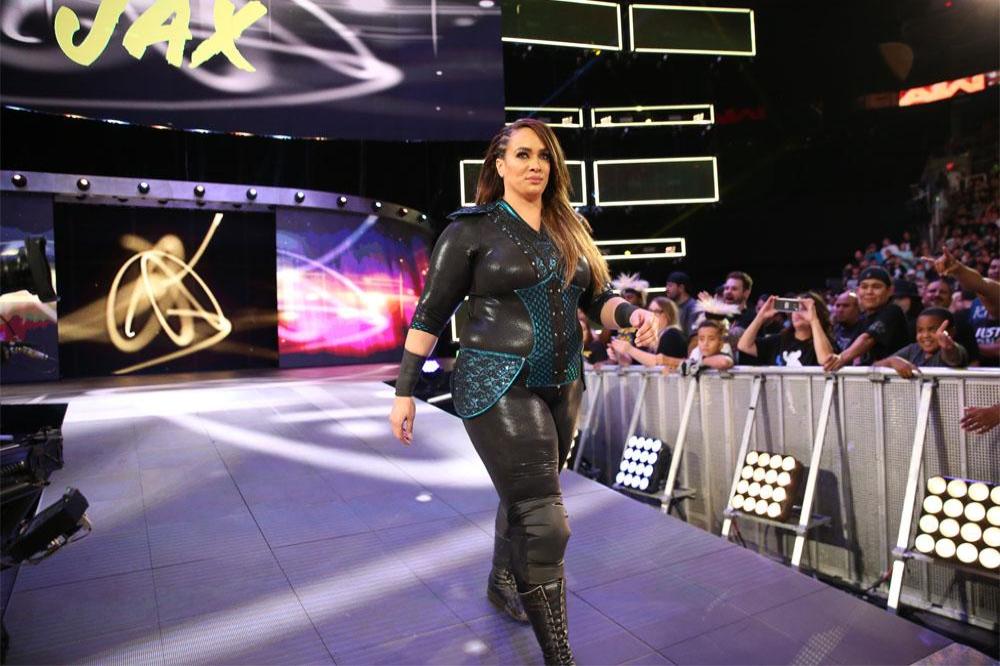 Nia Jax defends Roman Reigns after cancer speculation 