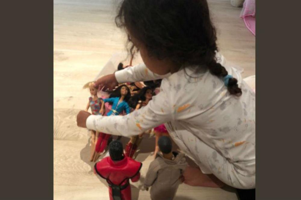 North West and her Kanye doll (c) Twitter
