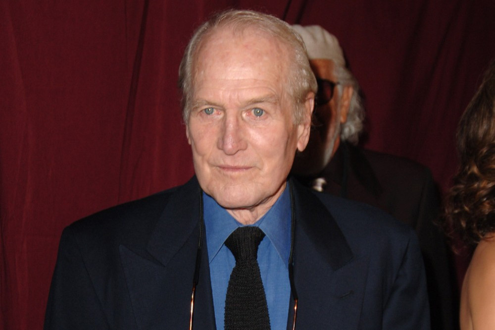 Paul Newman's two daughter have filed a lawsuit against the late actor's charity.