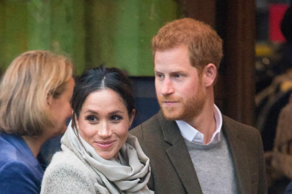 Prince Harry and Meghan Markle in Brixton (c)Zak Hussein