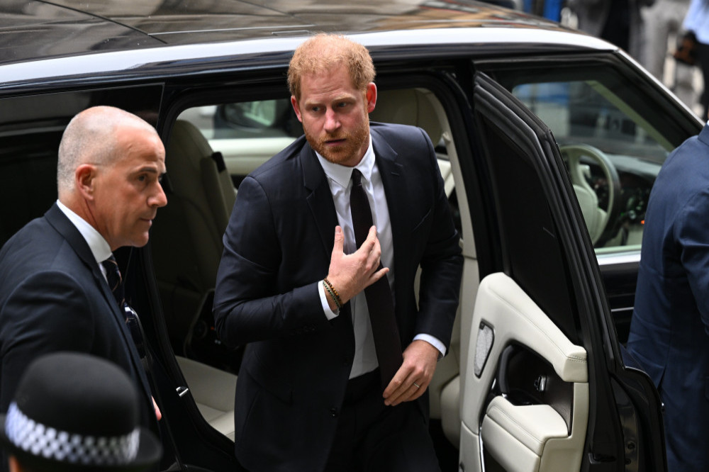 Prince Harry arrives at the court in London