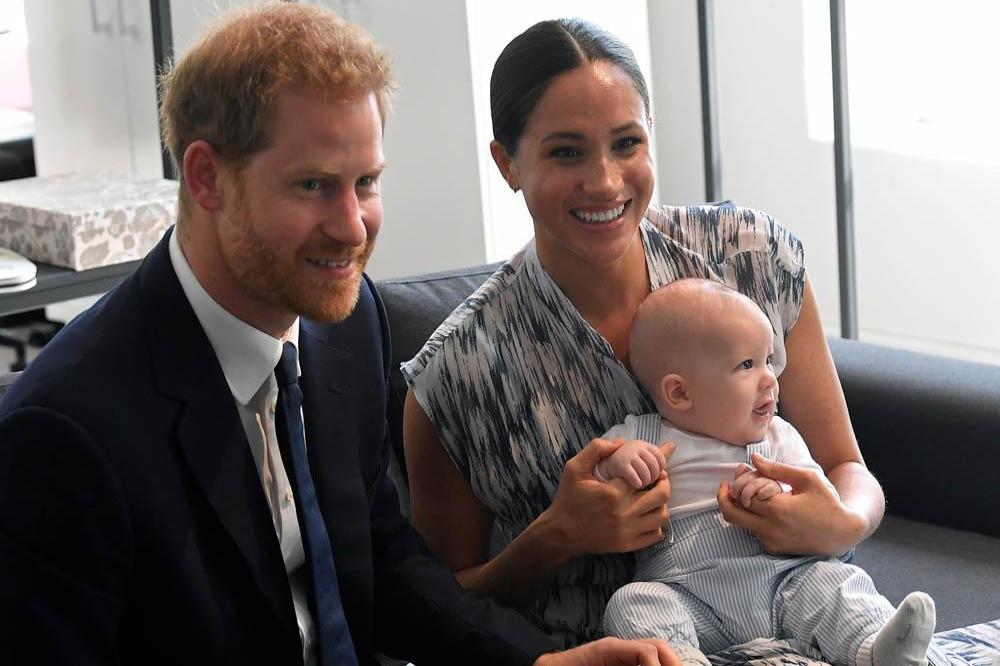 Prince Harry and Duchess Meghan with Archie 