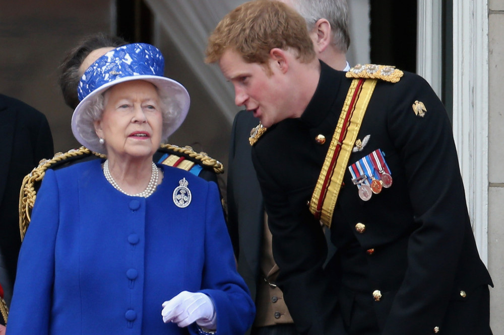 Queen Elizabeth with Prince Harry several years ago