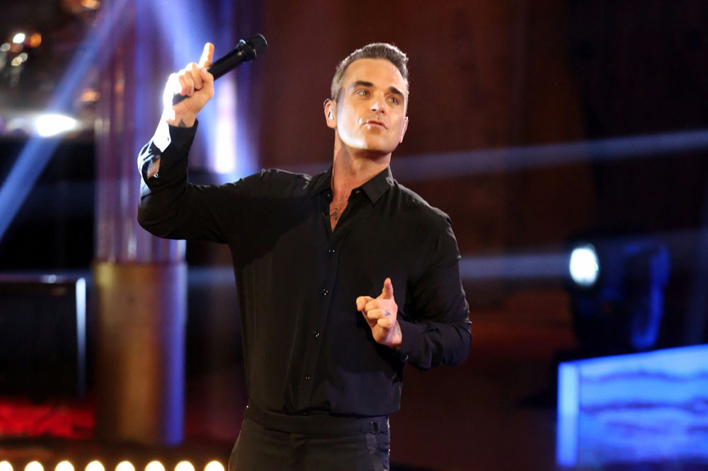 Robbie Williams will appear in his own biopic