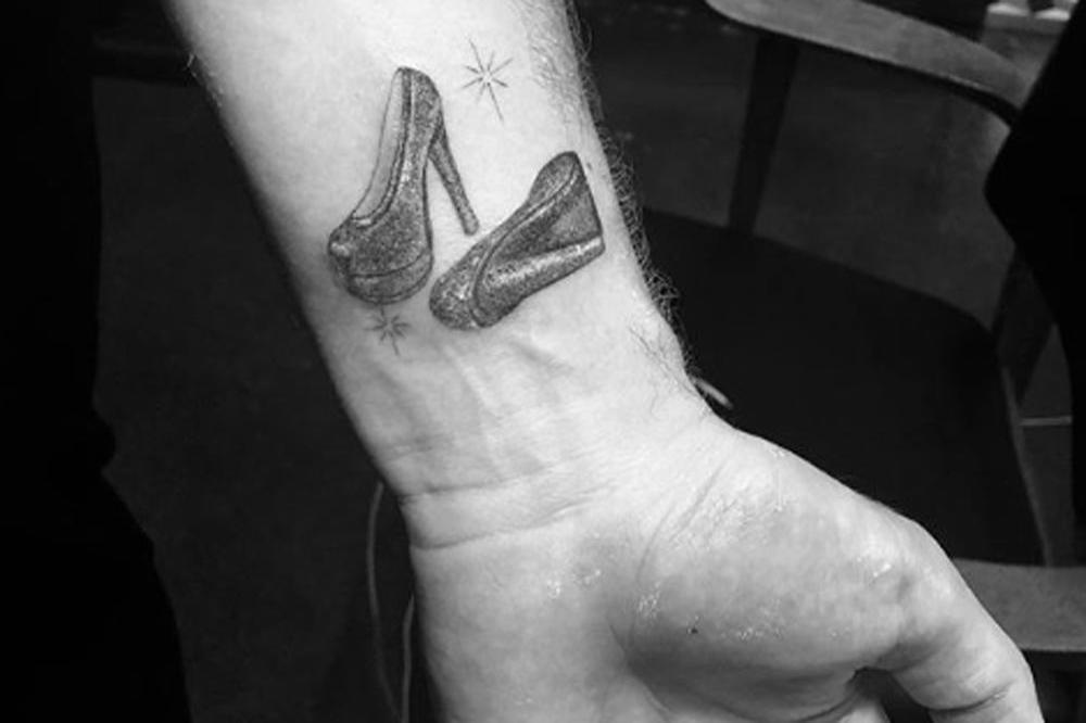 Sam Smith's stilettos tattoo (c) Instagram 