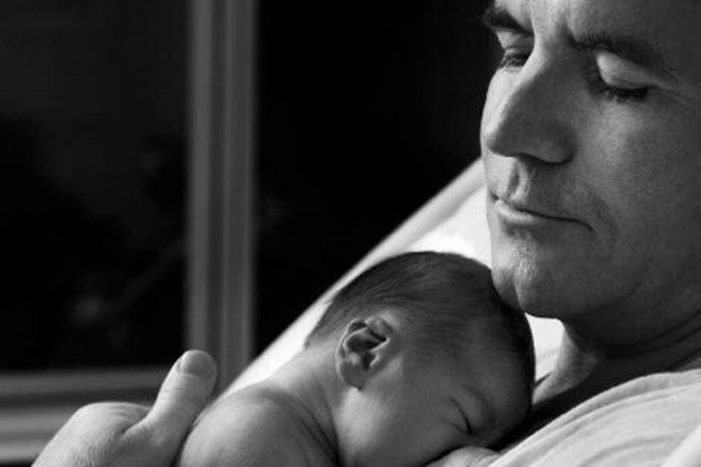 Simon Cowell with baby Eric