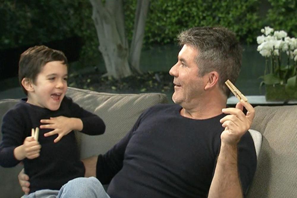 Simon Cowell and his son Eric
