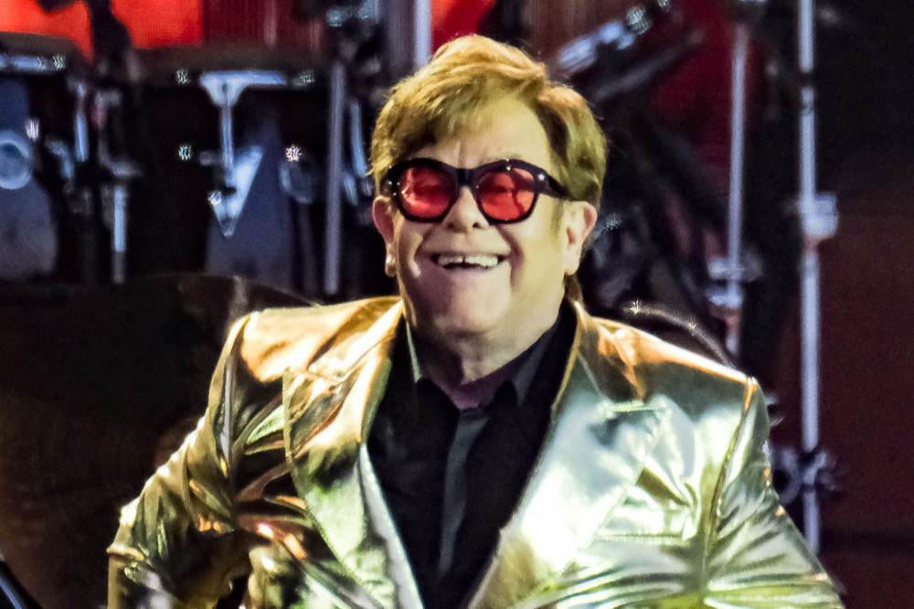 Sir Elton John has teamed up with Marmite again