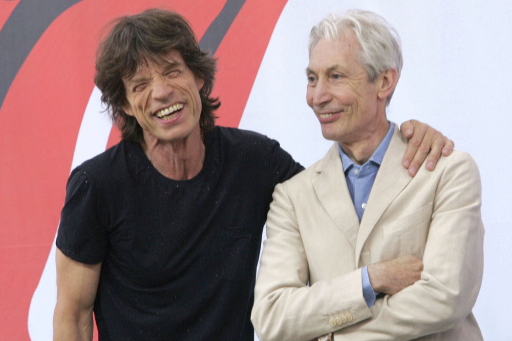 Sir Mick Jagger and Charlie Watts