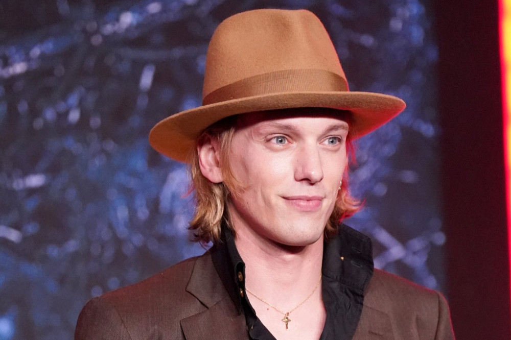 Jamie Campbell Bower wants to be a Bond villain