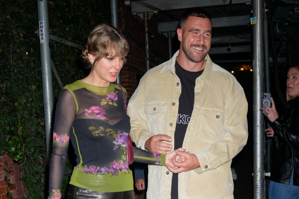 Taylor Swift and her parents reportedly celebrated Christmas with her boyfriend Travis Kelce and his dad