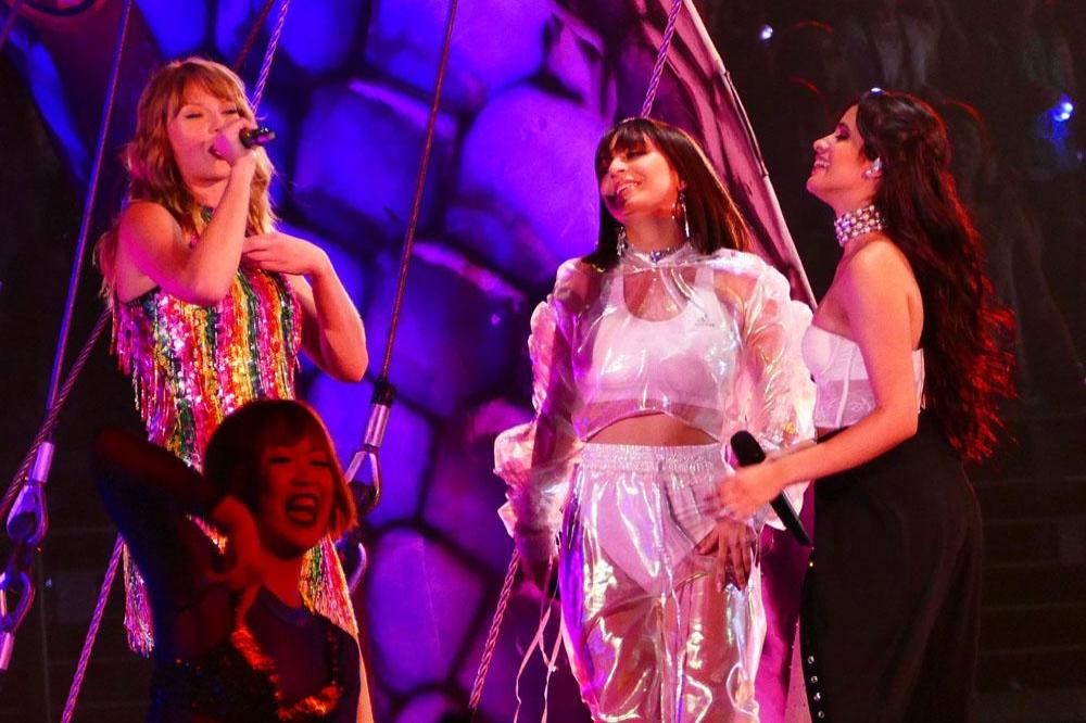 Charli XCX on stage with Taylor Swift