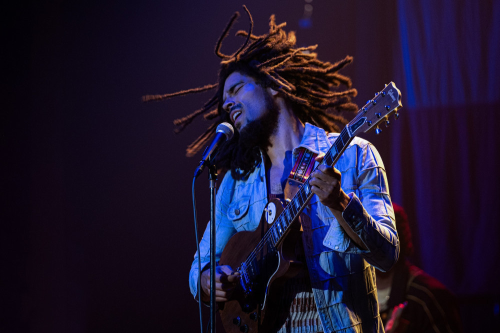 The director of 'Bob Marley: One Love' claims the reggae icon 'is the most recognisable face on the planet' after Jesus