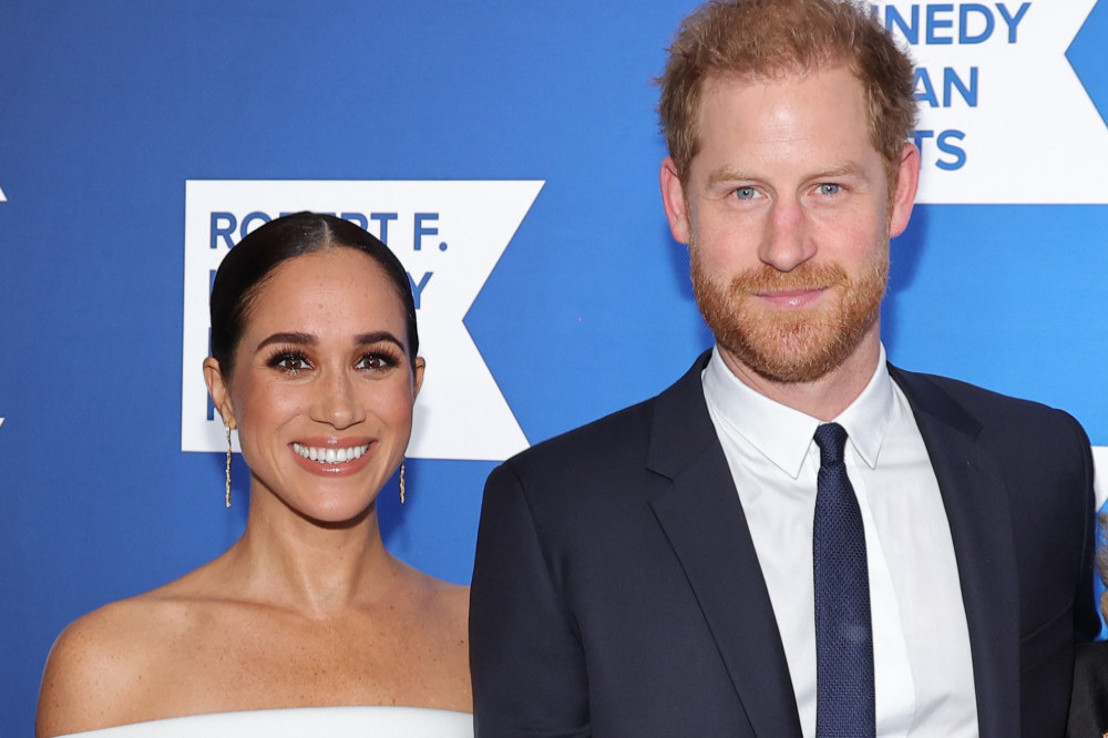 The Duke and Duchess of Sussex revealed their baby news at Princess Eugenie's wedding