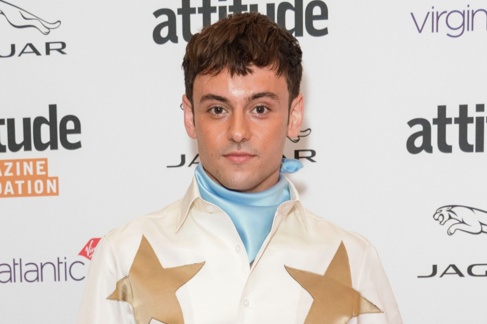 Tom Daley has unveiled his collection of kits