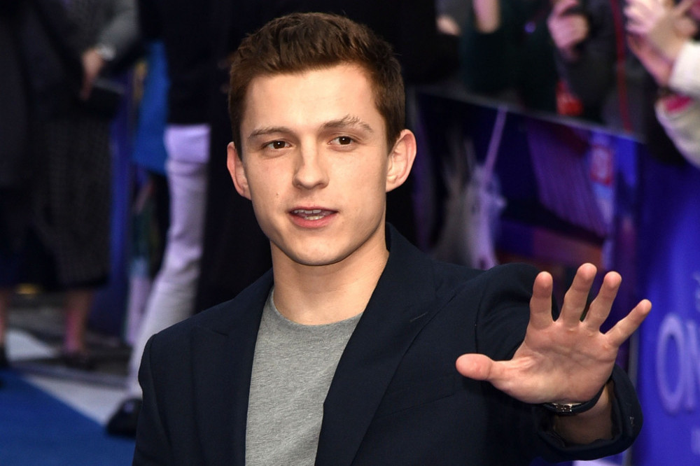 Tom Holland says someone wore a fake bottom in Spider-Man