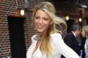 Blake Lively wears a blush-coloured cocktail dress