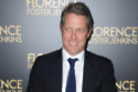 Hugh Grant doesn't get any pleasure from watching himself back