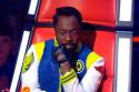 Will.i.am has been caught using his phone during the programme
