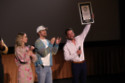 Logan Holladay was presented with his Guinness World Record by The Fall Guy stars Emily Blunt and Ryan Gosling