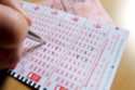 A woman bought a winning lottery ticket by mistake
