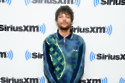Louis Tomlinson has found his confidence in his solo career and no longer compares himself to his former 1D bandmates