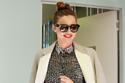 Miranda Kerr pairs her leather trousers with a printed blouse