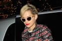 Rita Ora carries her red Lego Chanel clutch