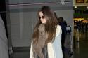 Selena Gomez keeps warm in a thick scarf