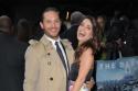 Tom Hardy wears a trench coat to the Dark Knight Rises premiere in London