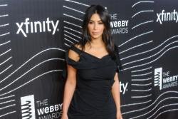 Kim Kardashian West will 'tone down' nude shoots