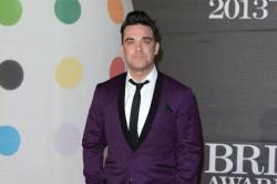 Robbie Williams Lost Pet Cat to Liam Gallagher