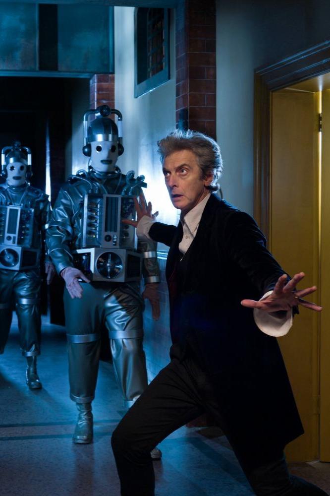 Peter Capaldi with the Cybermen