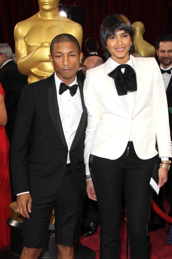 Pharrell Williams and his wife Helen Lasichanh at the Oscars 