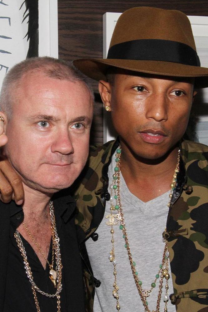 Pharrell Williams with Damien Hirst at dinner