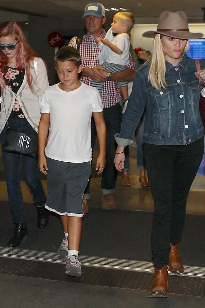 Reese Witherspoon with her children and Jim Toth