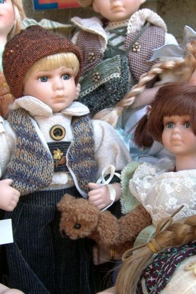 Toy dolls left on residents' doorsteps