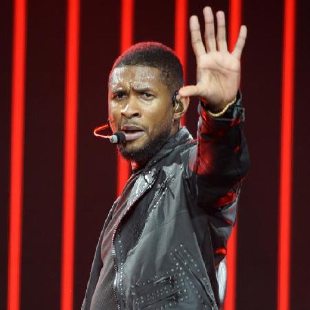 who was usher dating in 2012