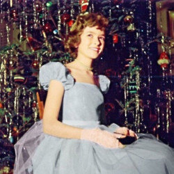 14-year-old Martha Stewart poses in front of the Christmas tree